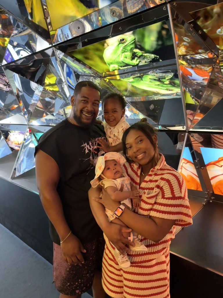 Andrew Quash with family smiling together